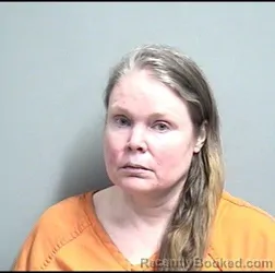 Mugshot of KRISTINE LEWISON MCNEIL booked in Dallas County, Iowa on May 3, 2026