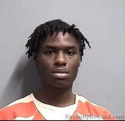Mugshot of OMARION MALIQUE OLIVER booked in Dallas County, Iowa on May 7, 2026