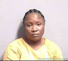Mugshot of PATIENCE SUNDAY SUAH booked in Dallas County, Iowa on May 10, 2026