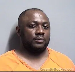 Mugshot of PIERRE CELESTIN NSHIMYUMUREMYI booked in Dallas County, Iowa on May 12, 2026