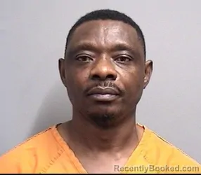 Mugshot of RUPHIN MUKENYI NTUMBA booked in Dallas County, Iowa on July 3, 2026