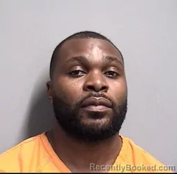 Mugshot of Michee Chinyama booked in Dallas County, Iowa on August 27, 2026