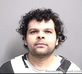 Mugshot of Israel Diaz booked in Dallas County, Iowa on August 28, 2026