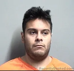Mugshot of Julio Adrian Ruiz booked in Dallas County, Iowa on September 7, 2026