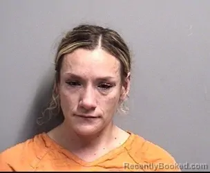 Mugshot of Ashley Marie Lussman booked in Dallas County, Iowa on October 1, 2026