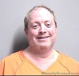 Mugshot of Damon David Carlson booked in Dallas County, Iowa on October 3, 2026