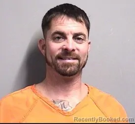 Mugshot of Rory Davis Russell booked in Dallas County, Iowa on October 22, 2026