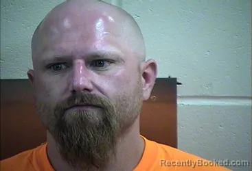 Mugshot of DUSTIN EDWARD FICKES booked in Decatur County, Iowa on March 27, 2026