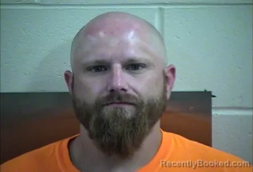 Mugshot of DUSTIN EDWARD FICKES booked in Decatur County, Iowa on April 24, 2026