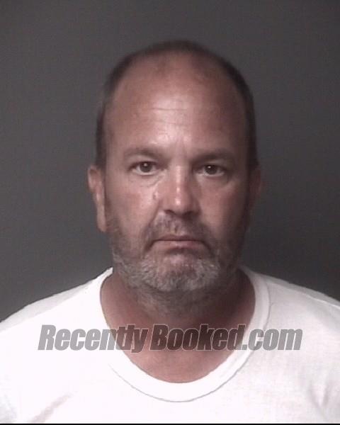 Booking photo from Dubuque County, Iowa