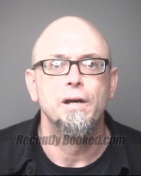 Booking photo from Dubuque County, Iowa
