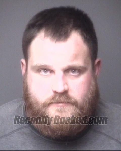 Booking photo from Dubuque County, Iowa