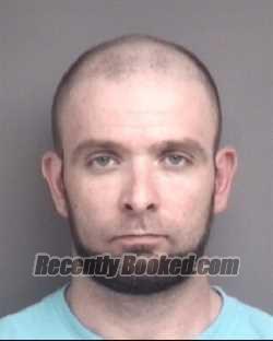 Booking photo from Dubuque County, Iowa