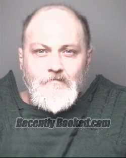 Booking photo from Dubuque County, Iowa