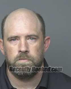 Booking photo from Dubuque County, Iowa