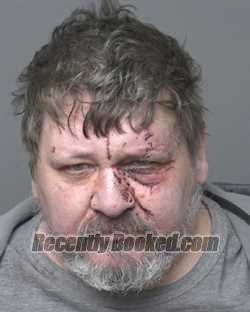 Booking photo from Dubuque County, Iowa