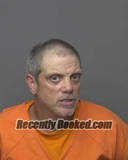 Booking photo from Dubuque County, Iowa