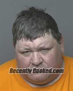 Booking photo from Dubuque County, Iowa