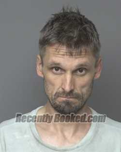 Booking photo from Dubuque County, Iowa
