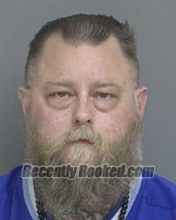 Booking photo from Dubuque County, Iowa