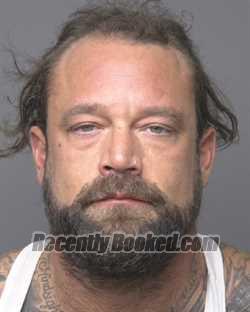 Booking photo from Dubuque County, Iowa
