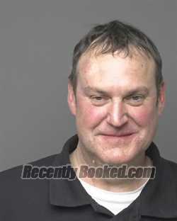 Booking photo from Dubuque County, Iowa