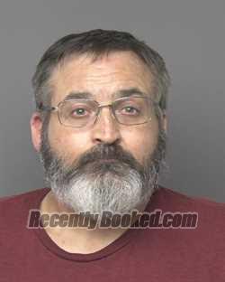 Booking photo from Dubuque County, Iowa