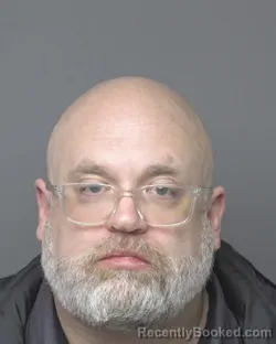 Booking photo from Dubuque County, Iowa