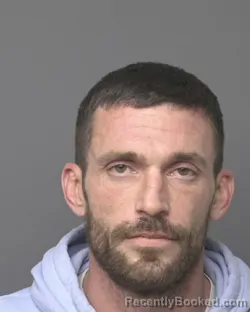 Booking photo from Dubuque County, Iowa