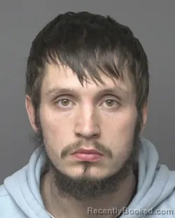 Mugshot of AUSTINE JEFFERSON THOMAS booked in Dubuque County, Iowa on March 19, 2026