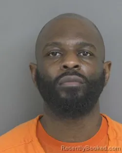 Mugshot of MARLIN DOUGLAS DARIUS COSSOM booked in Dubuque County, Iowa on March 7, 2026