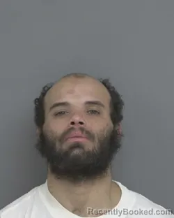 Mugshot of TYLER MARCUS HARRINGTON booked in Dubuque County, Iowa on March 8, 2026