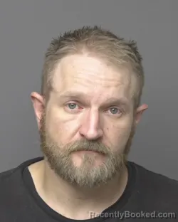 Mugshot of CODY GARRETT DAVIS FINZEL booked in Dubuque County, Iowa on March 8, 2026