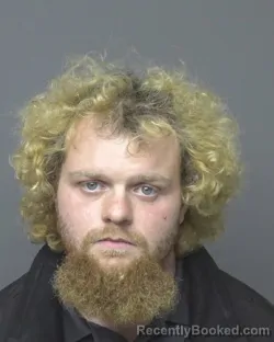 Mugshot of DAKOTA JOSEPH THOMPSON booked in Dubuque County, Iowa on March 18, 2026