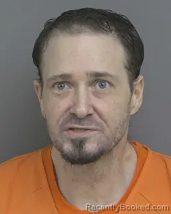 Mugshot of ANDREW JOHN PSAROS booked in Dubuque County, Iowa on March 19, 2026