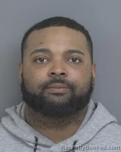 Mugshot of ANTONIO PATRICK MILONS booked in Dubuque County, Iowa on March 21, 2026