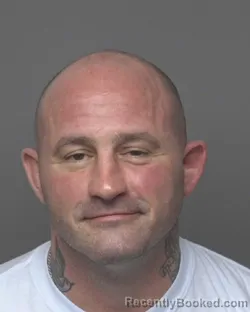 Mugshot of CORY JOHN BEDTKA booked in Dubuque County, Iowa on March 21, 2026