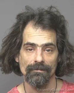 Mugshot of JOHN RICHARD HARTLEY MCGEE booked in Dubuque County, Iowa on March 21, 2026