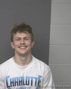 Mugshot of ASHTON HUNTER-RAY HAYHURST booked in Dubuque County, Iowa on March 22, 2026