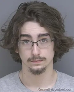 Mugshot of CODY MICHAEL CLIBURN booked in Dubuque County, Iowa on March 22, 2026