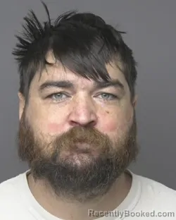 Mugshot of ZACHARY DAVID HOWE booked in Dubuque County, Iowa on March 22, 2026