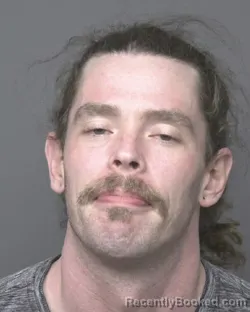 Mugshot of THOMAS MICHAEL TOURDOT booked in Dubuque County, Iowa on March 25, 2026