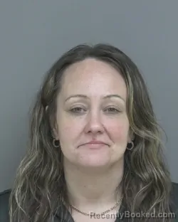 Mugshot of BRANDY MAE RAUSCH booked in Dubuque County, Iowa on March 27, 2026