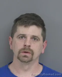 Mugshot of BRANDON ALLEN MOLZOF booked in Dubuque County, Iowa on March 27, 2026