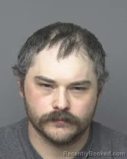 Mugshot of BLAKE THOMAS AMLING booked in Dubuque County, Iowa on March 28, 2026