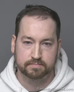 Mugshot of TIMOTHY MICHAEL ALAN CURRAN booked in Dubuque County, Iowa on March 29, 2026