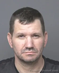 Mugshot of CHRISTOPHER ROBERT COMEAU booked in Dubuque County, Iowa on March 29, 2026