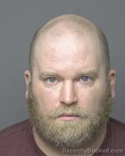 Mugshot of RYAN MICHAEL KRAFT booked in Dubuque County, Iowa on March 30, 2026