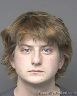 Mugshot of ELIJAH DAVID SMITH booked in Dubuque County, Iowa on March 30, 2026