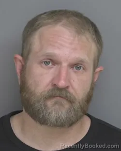 Mugshot of CODY GARRETT DAVIS FINZEL booked in Dubuque County, Iowa on March 30, 2026